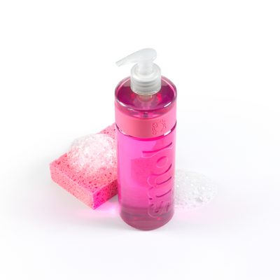 smol's grapefruit washing up liquid bottle placed beside a foamy pink sponge